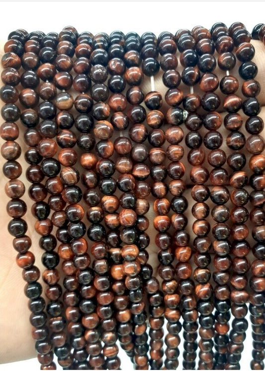 Perles Oeil de Taureau 4mm sur fil 40cm